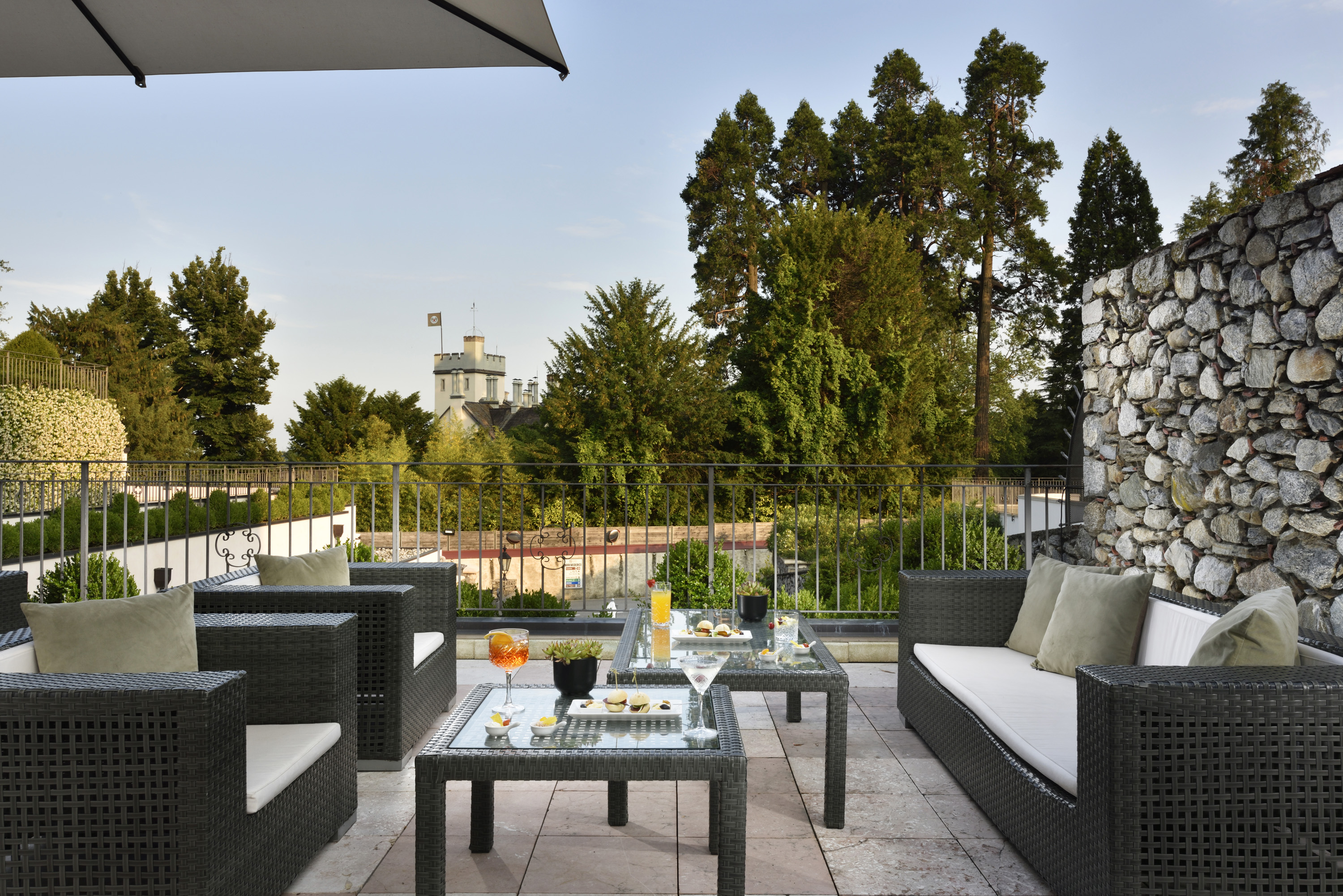 a patio with a table and chairs