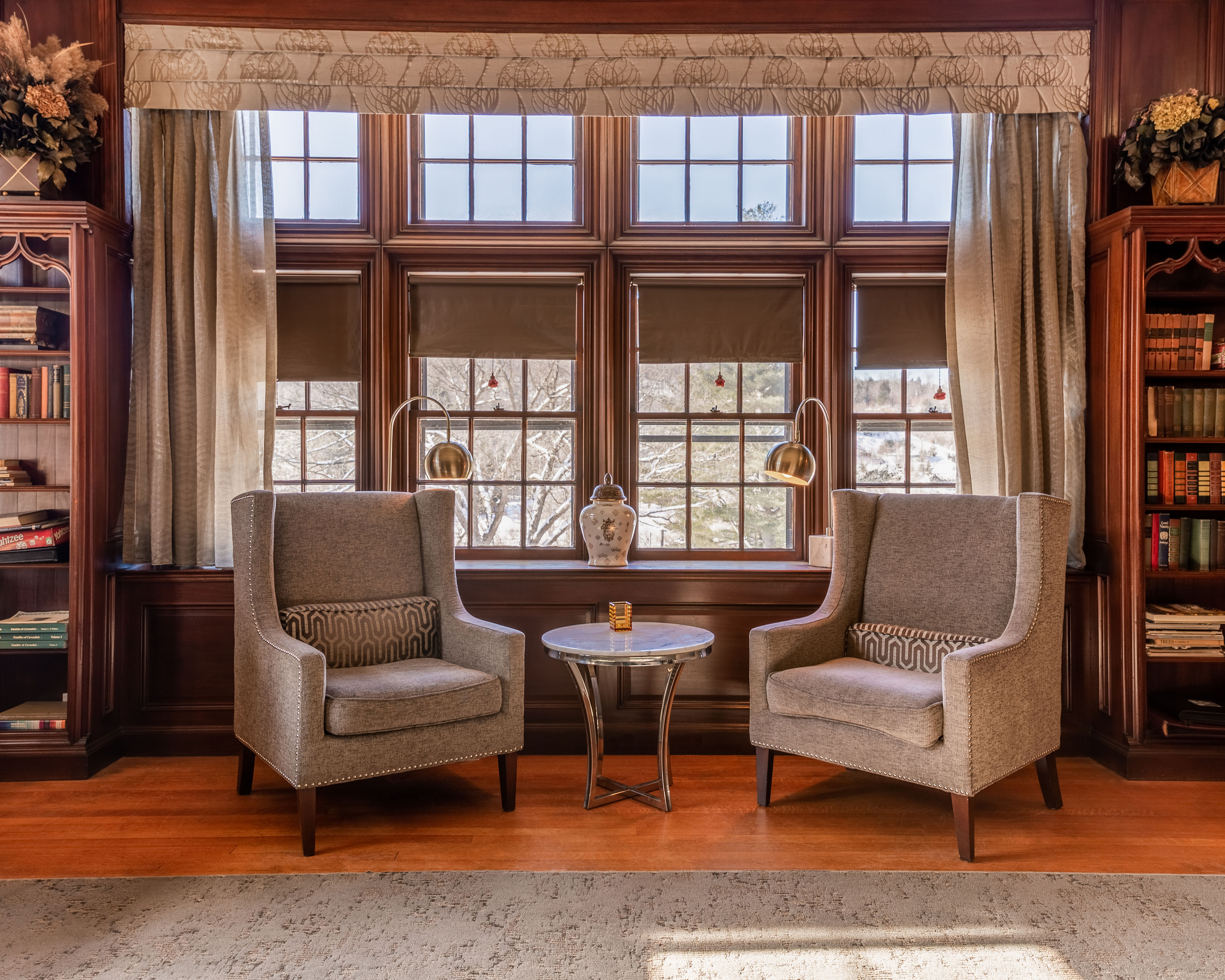 a room with two chairs and a table