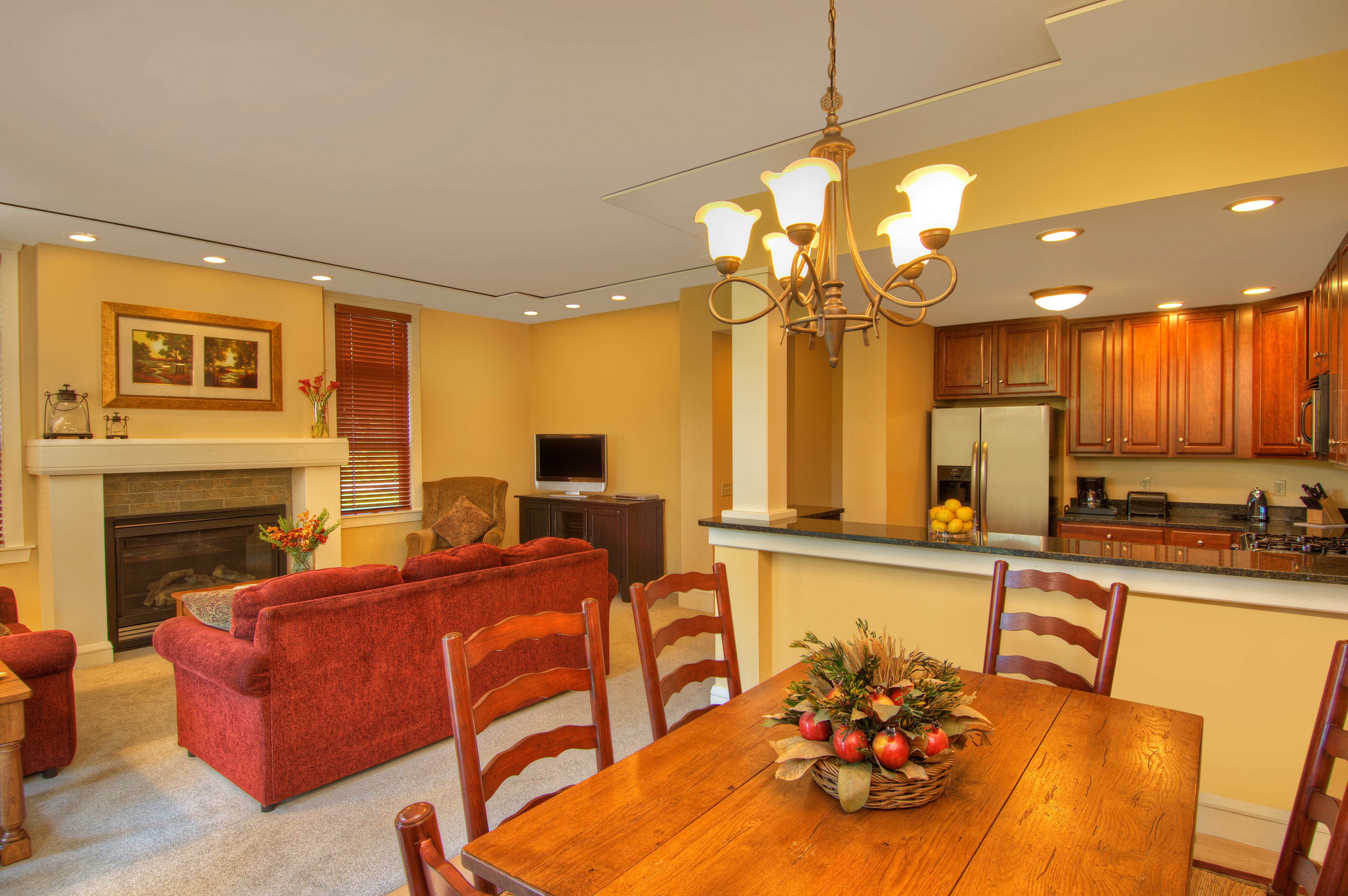 a dining table and chairs in a living room