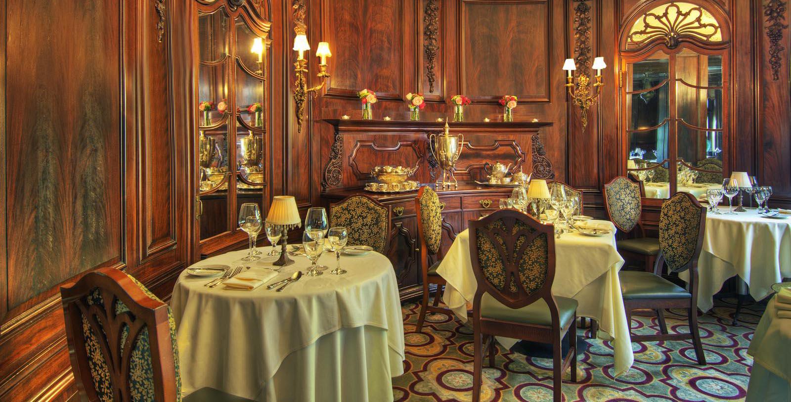 a restaurant with tables and chairs