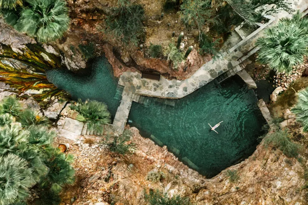 a person swimming in a pool