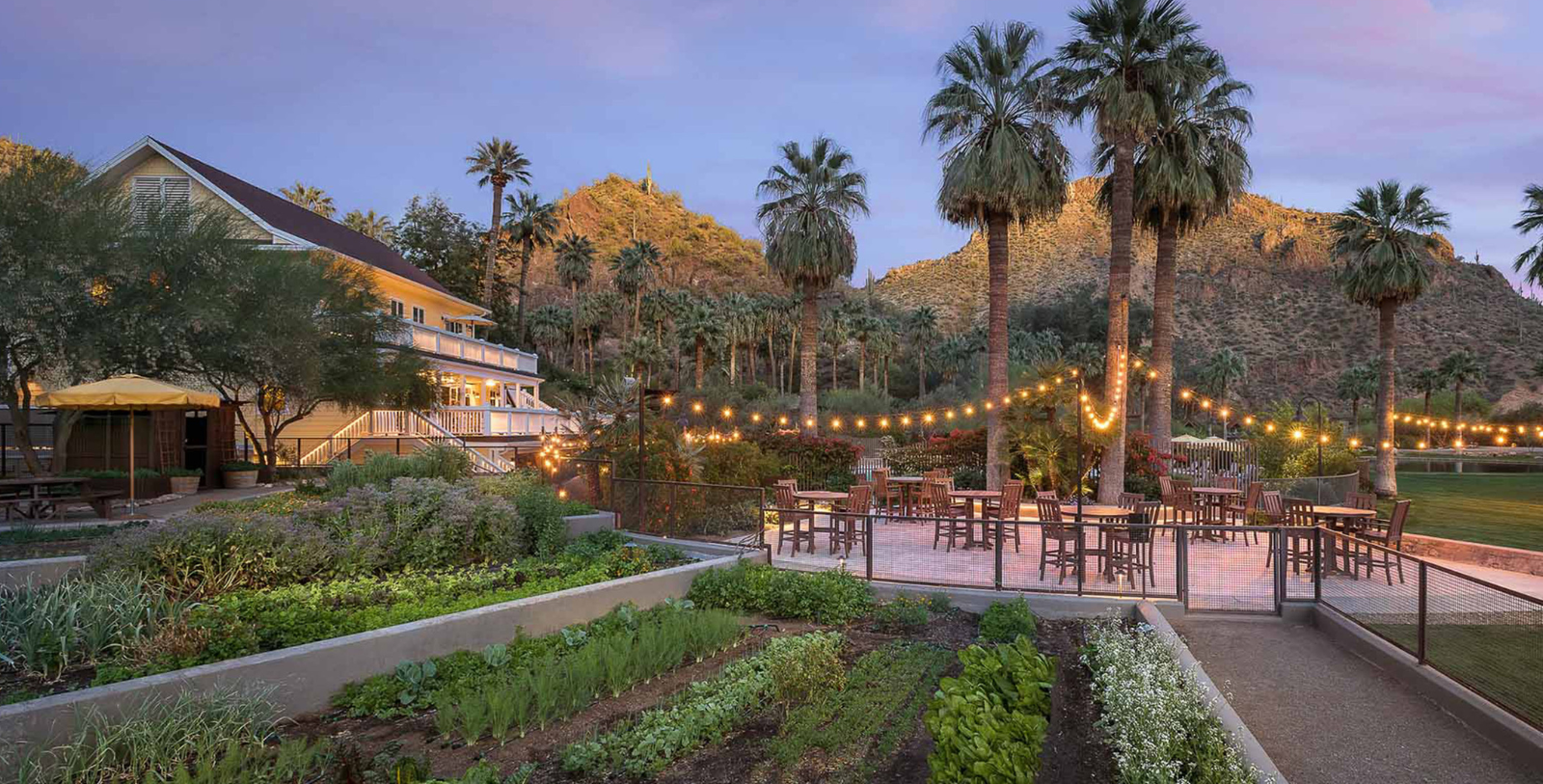 a patio with lights from a string of lights