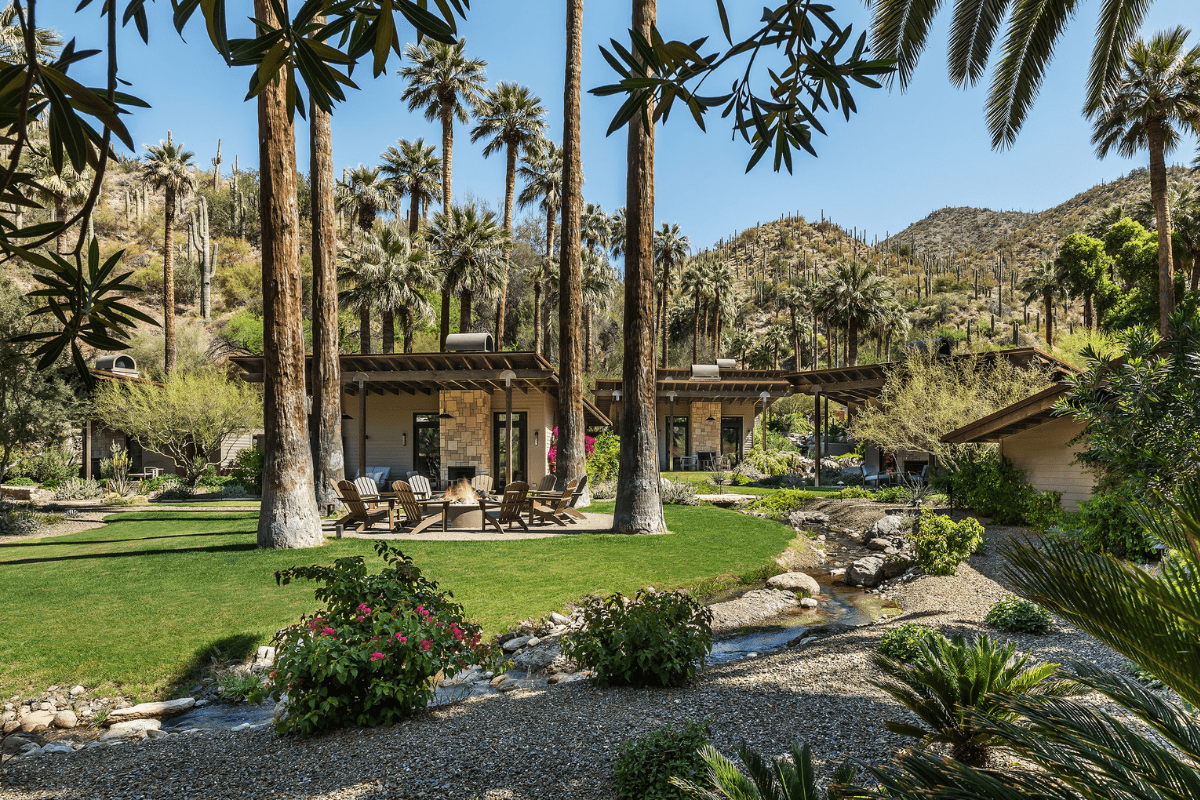 a house with a patio and trees