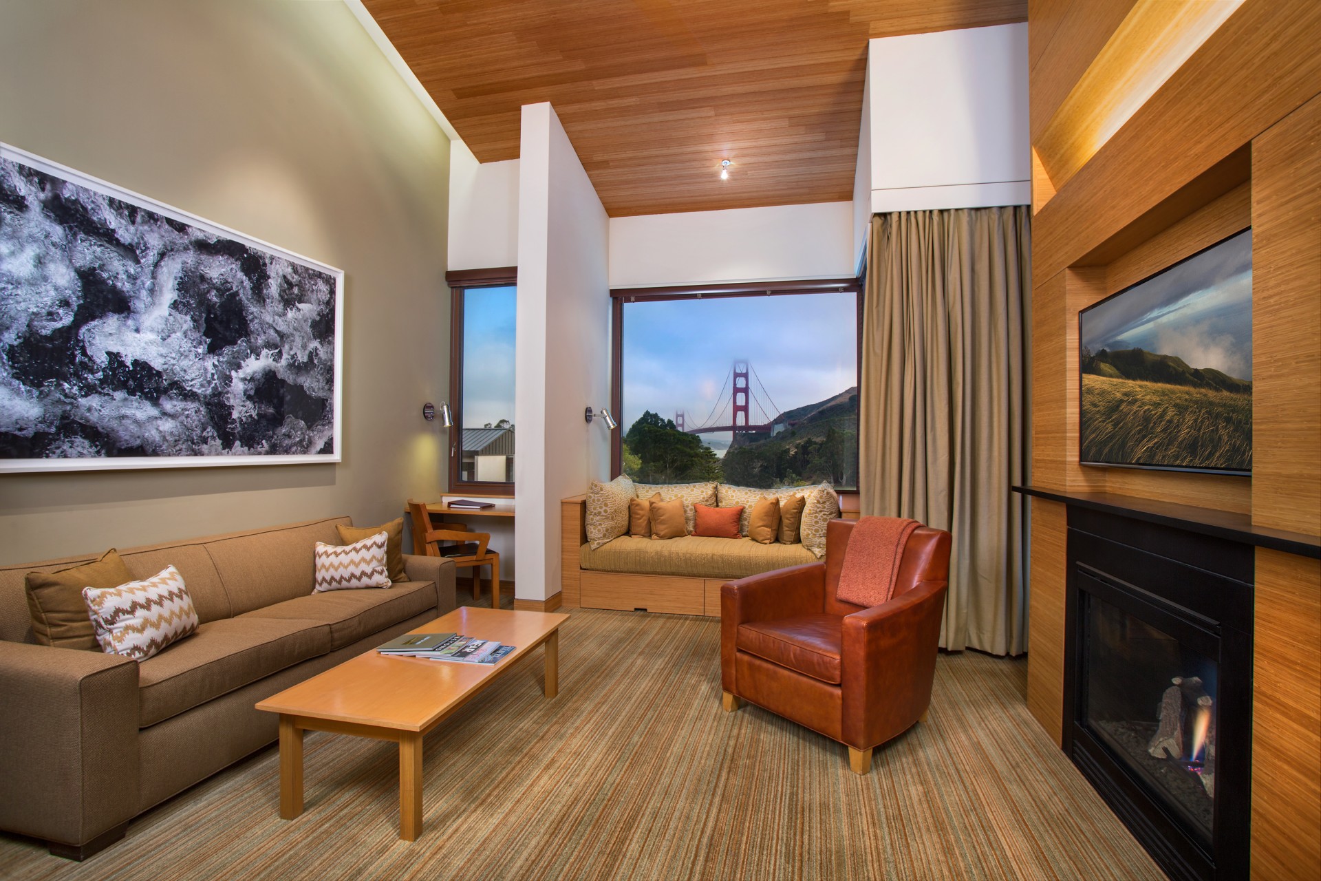a living room with a television and couches