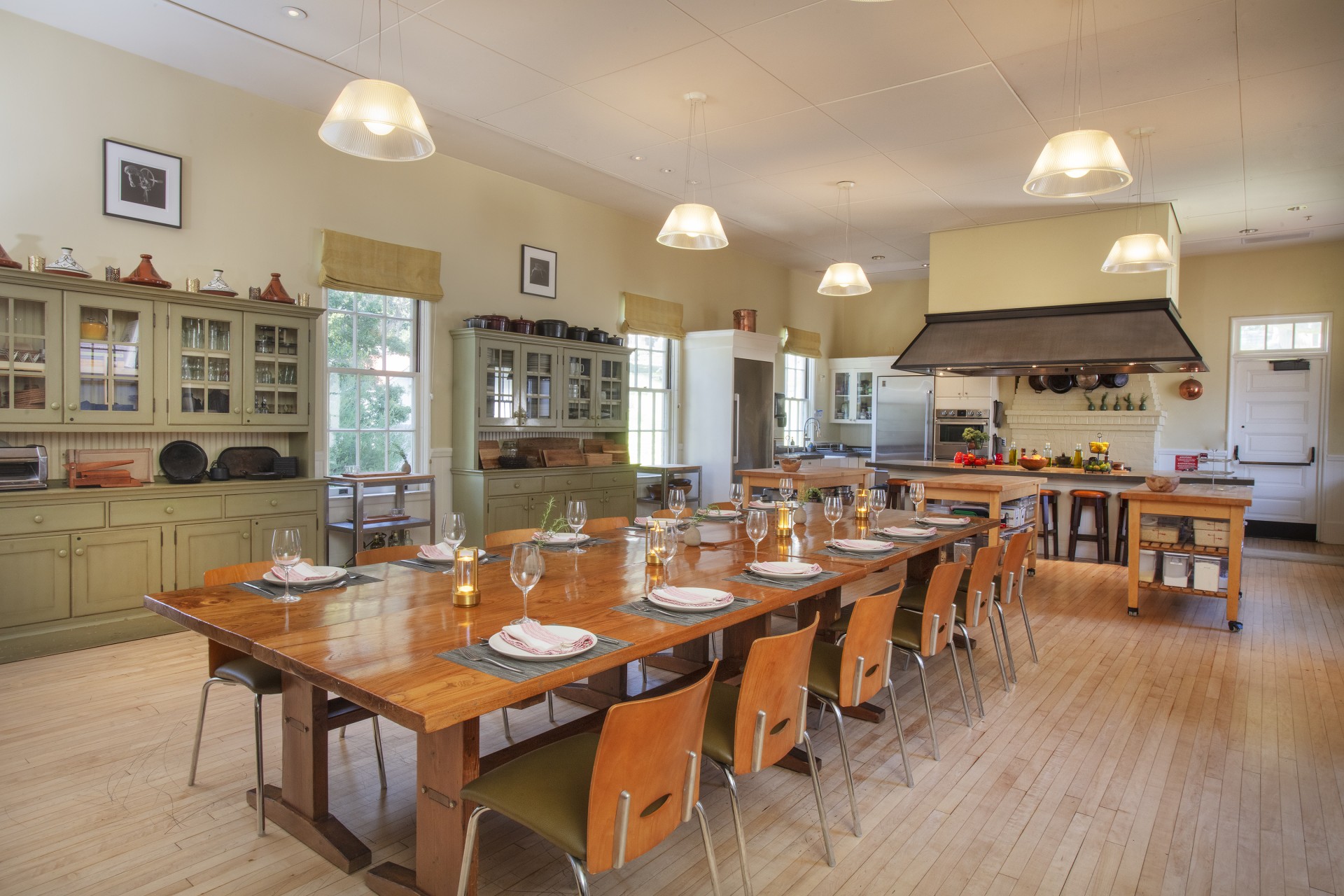 a large dining room with a large table and chairs