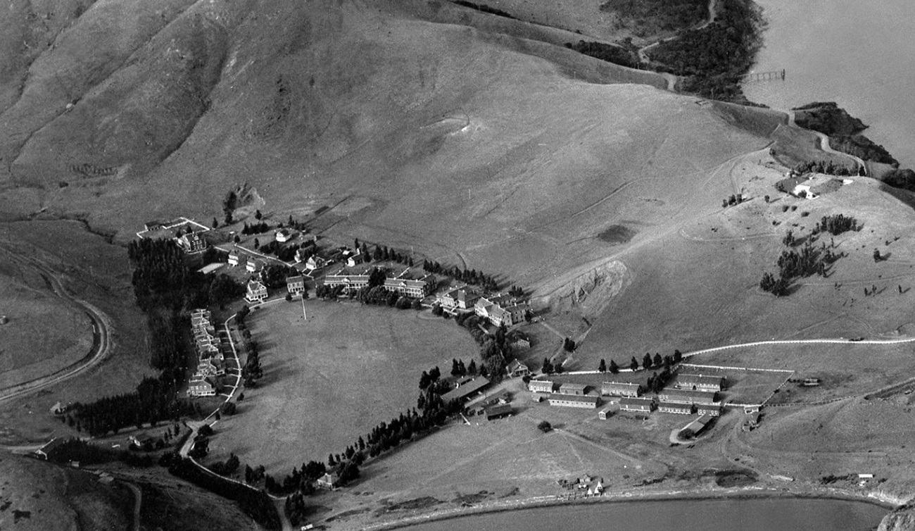 a black and white photo of a village