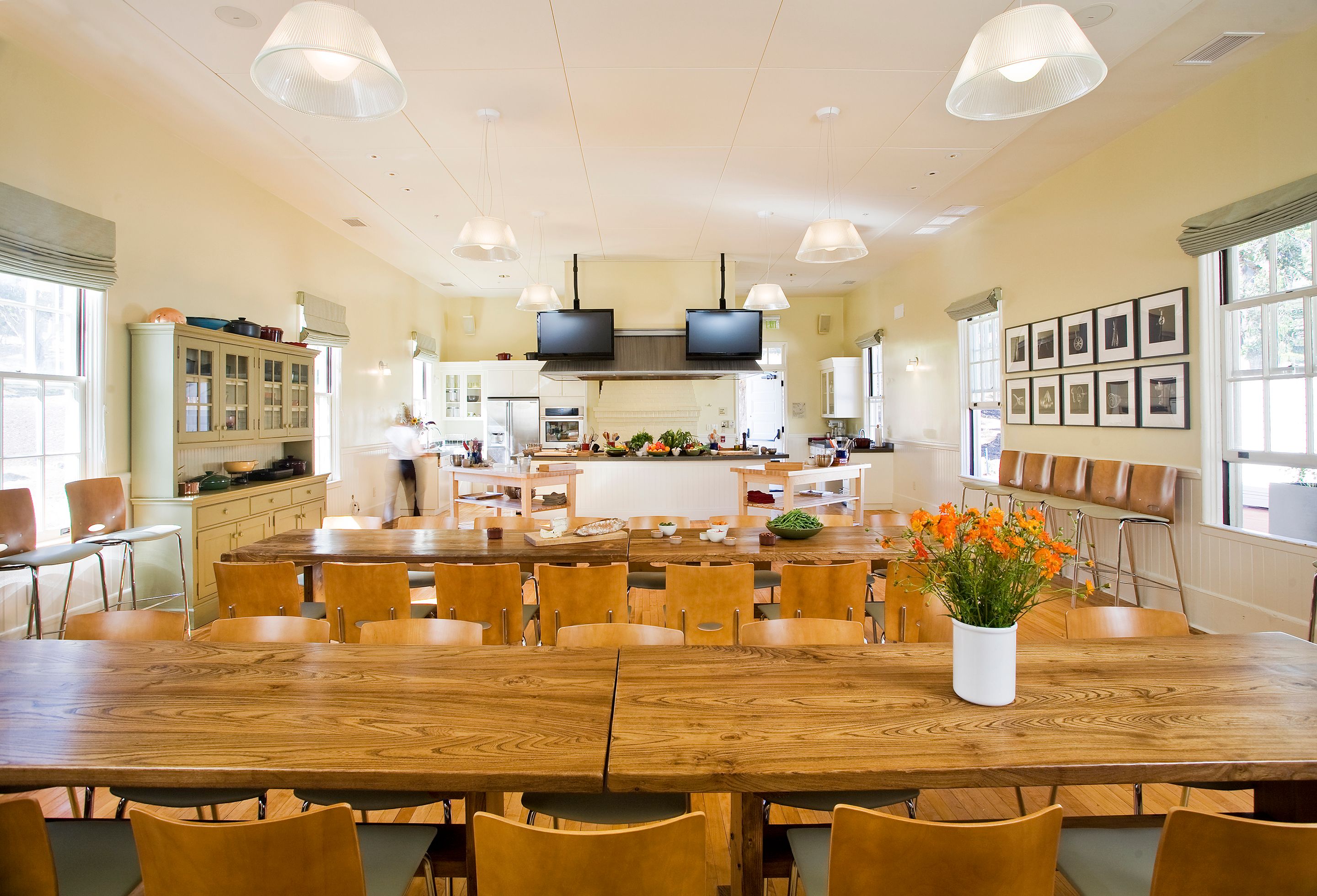 a room with a large table and chairs