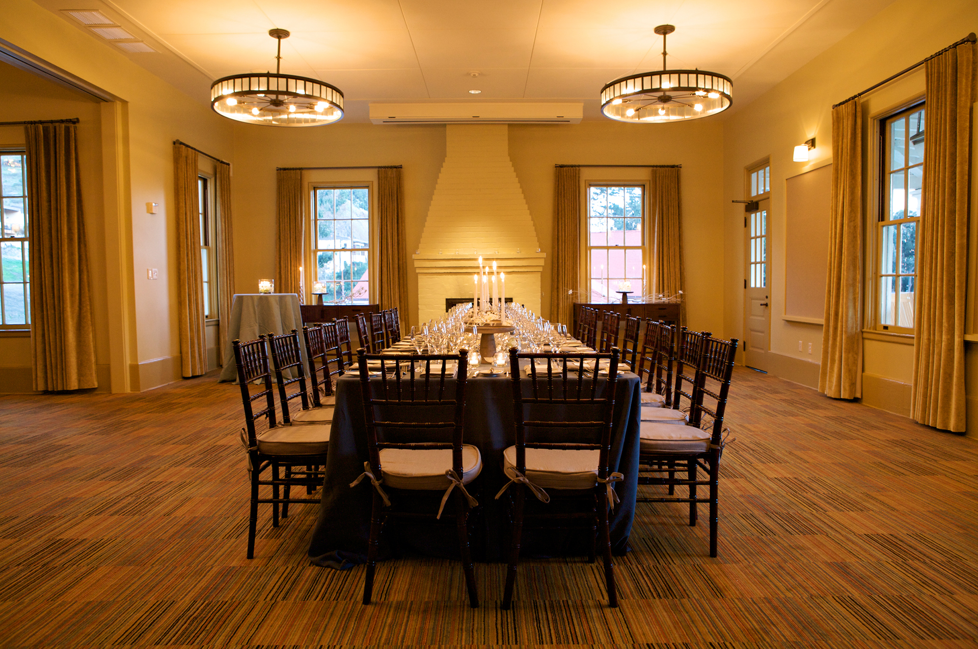 a long table with candles on it