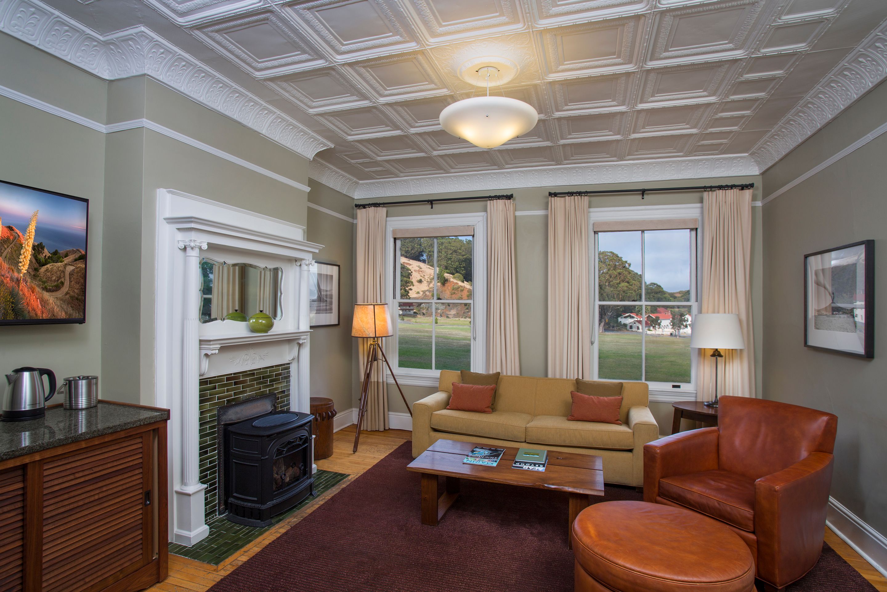 a living room with a fireplace and a couch