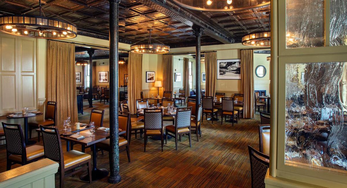 a restaurant with tables and chairs