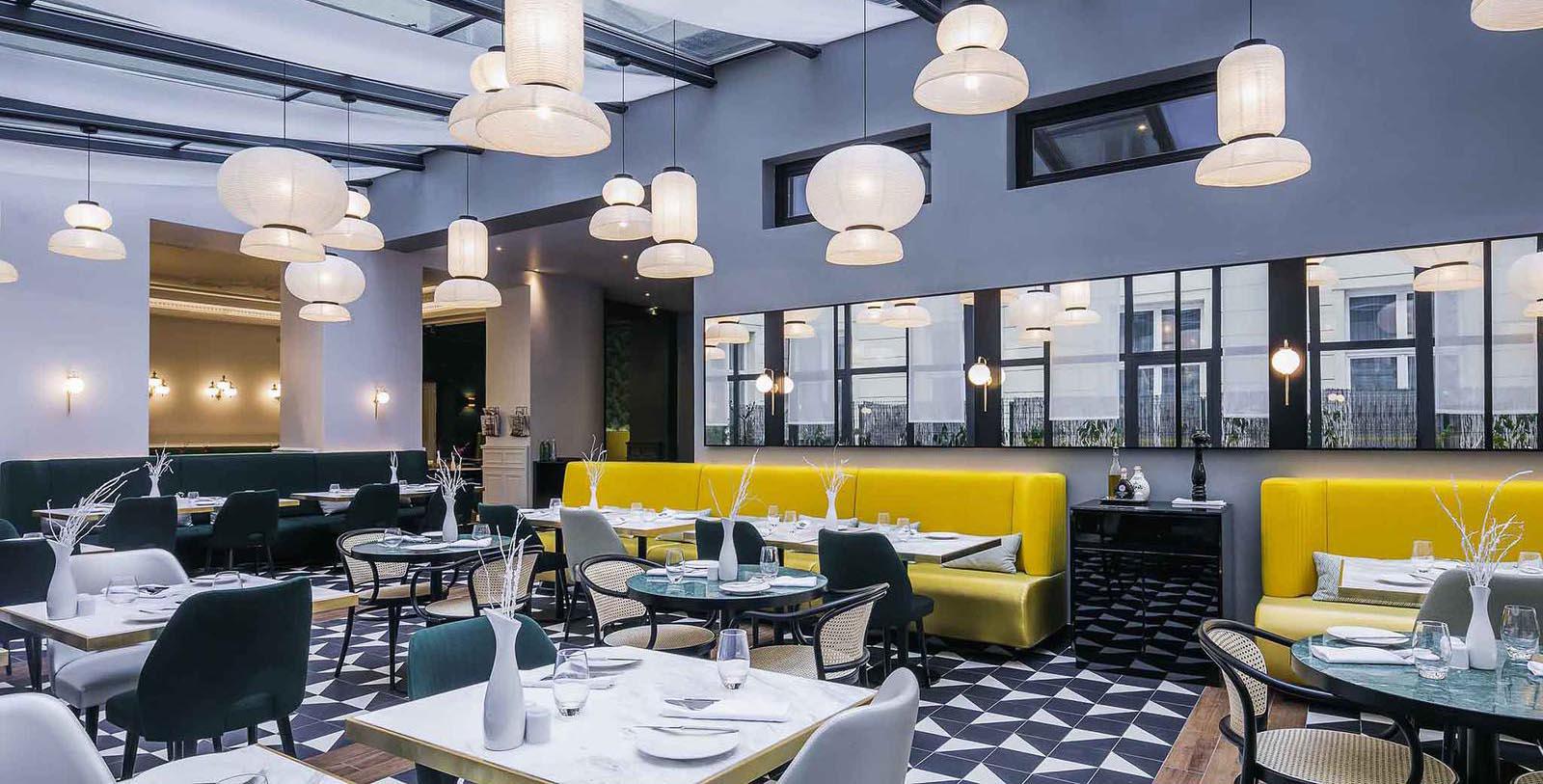 a restaurant with tables and chairs