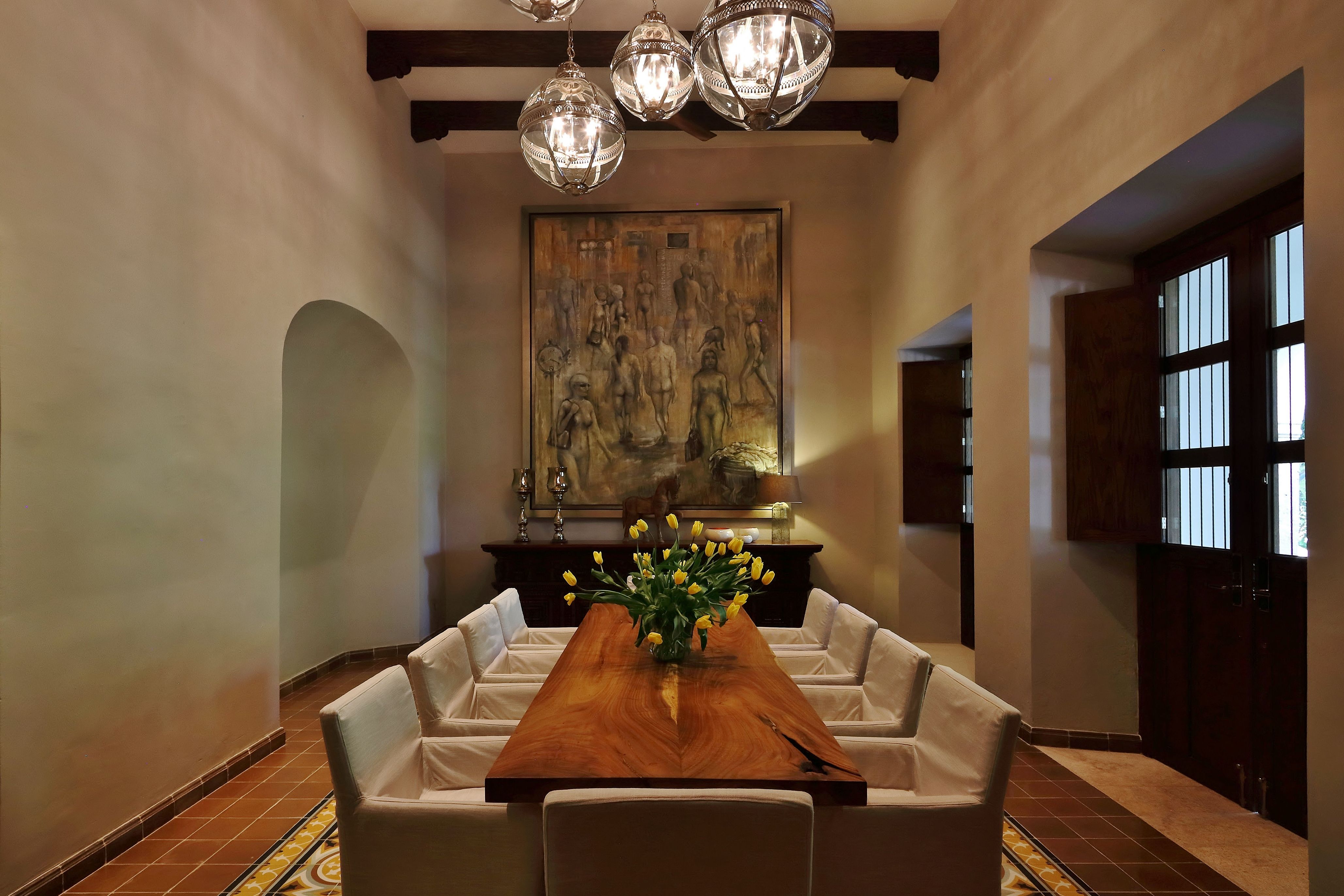 a room with a table and chairs