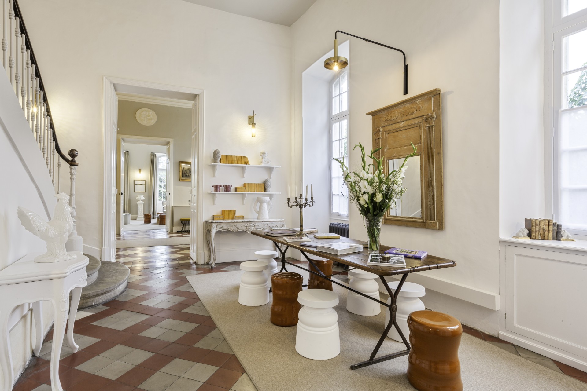 a room with a table and stools