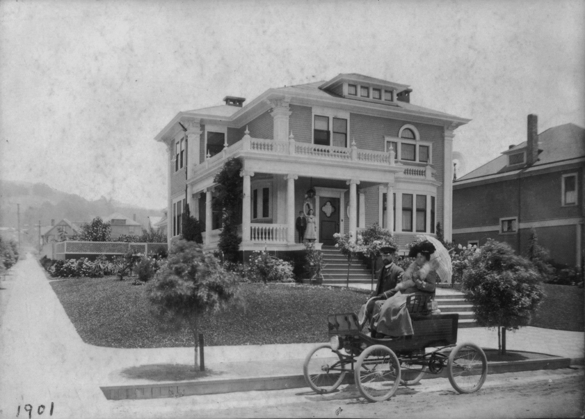 a couple riding in a carriage