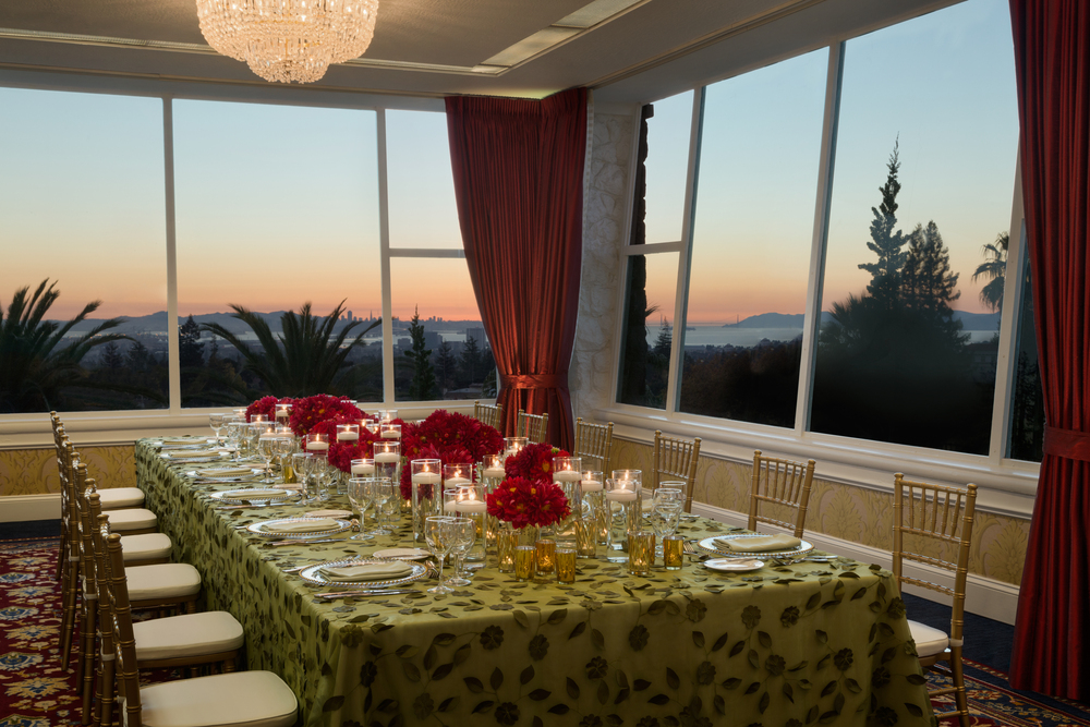a table with candles and flowers on it