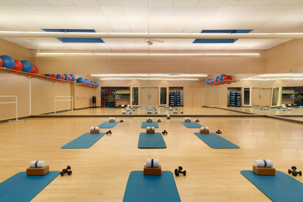a room with mats and balls