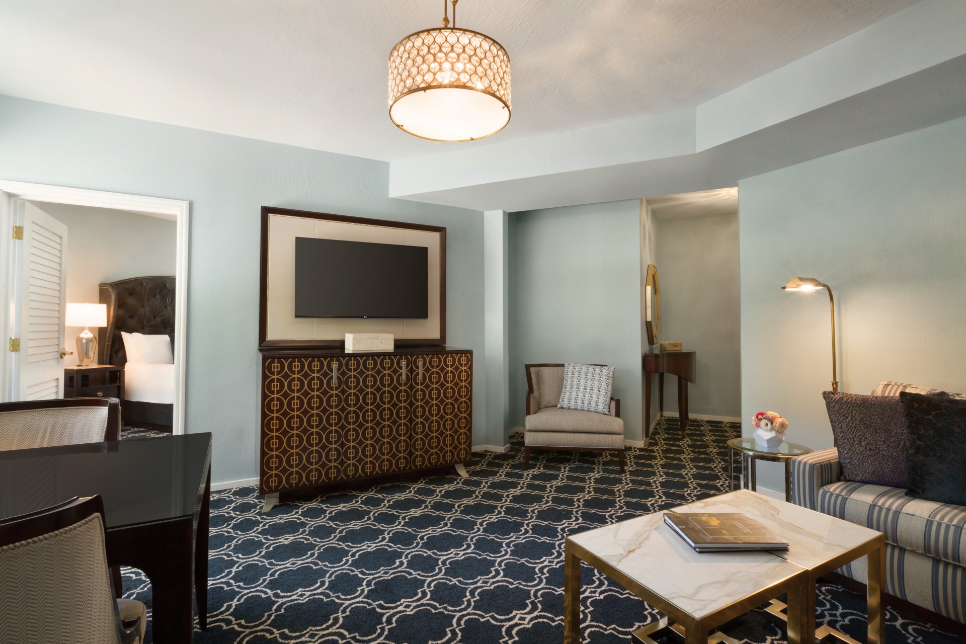 a room with a television and a table