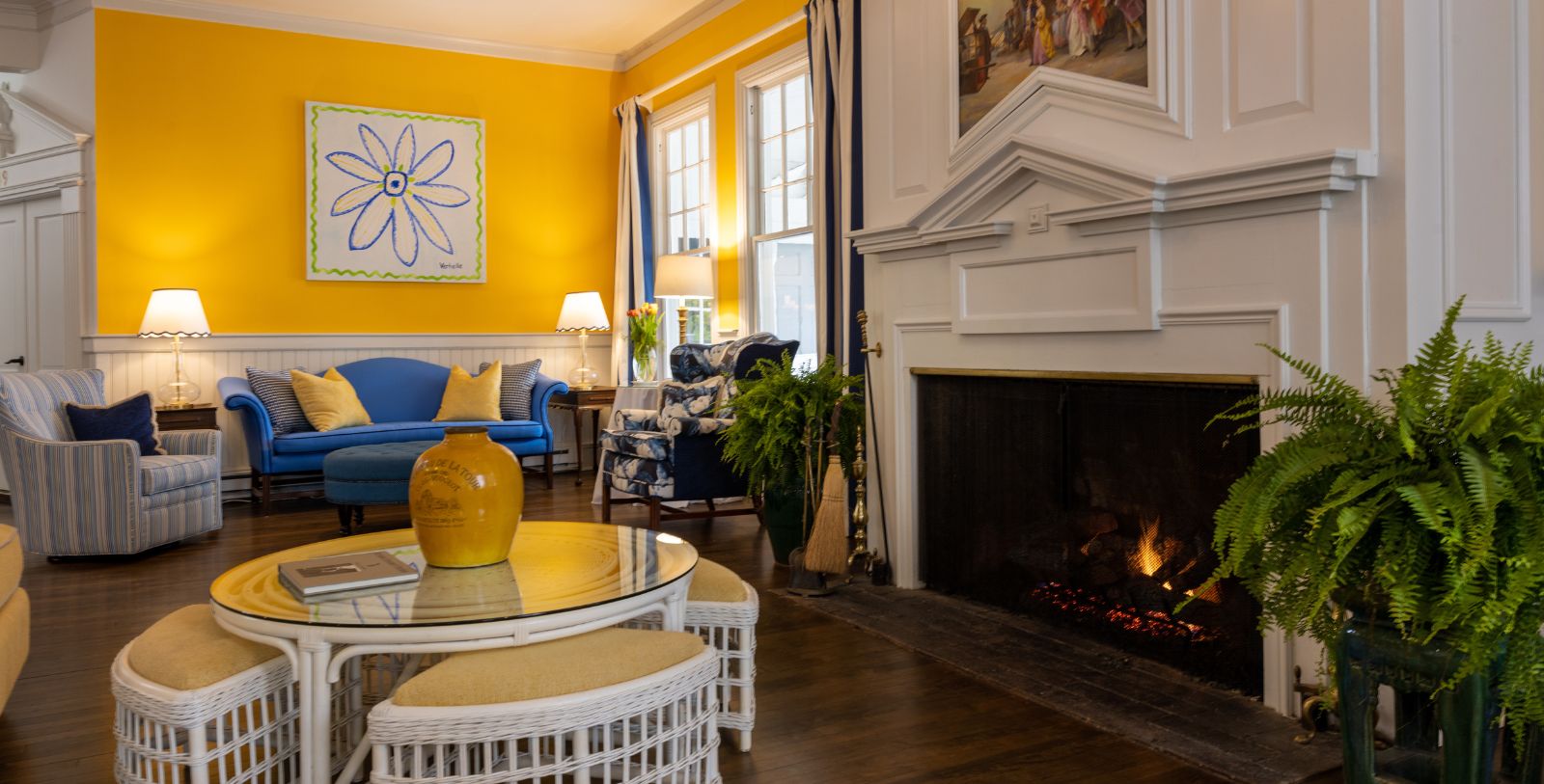 a living room with a fireplace and a couch