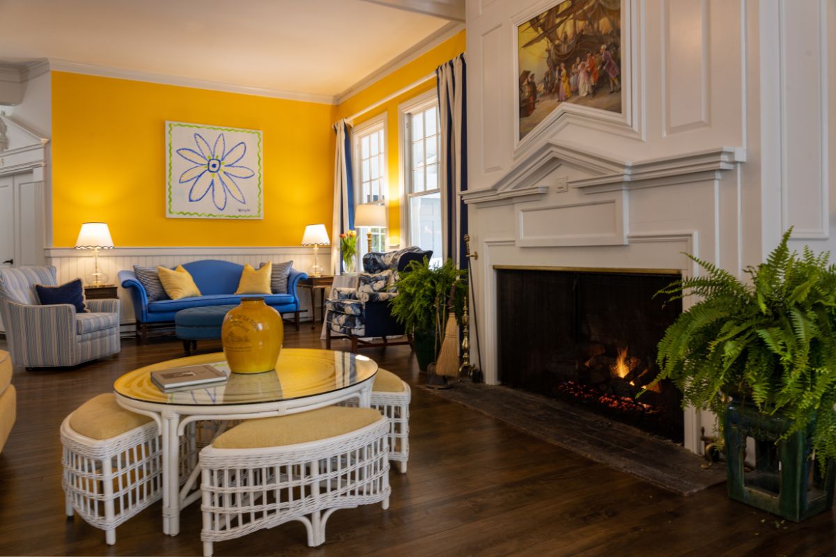a living room with a fireplace and a couch