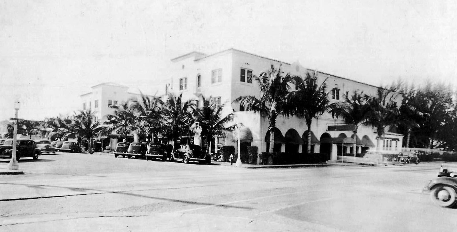 a building with palm trees