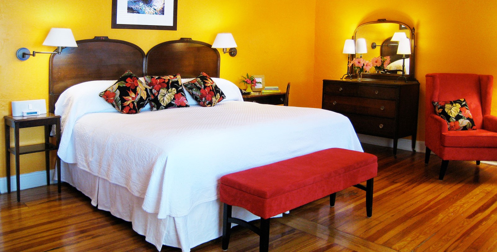 a bedroom with a bed and a bench