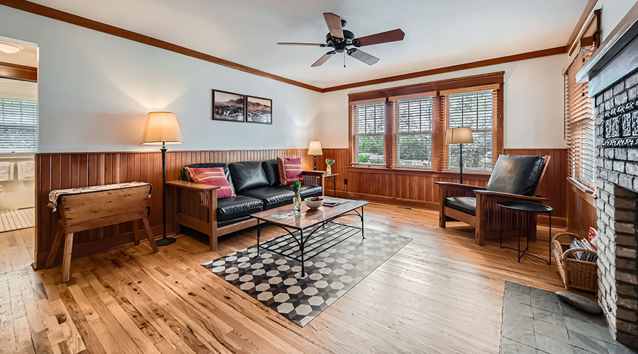 a living room with a couch and a table