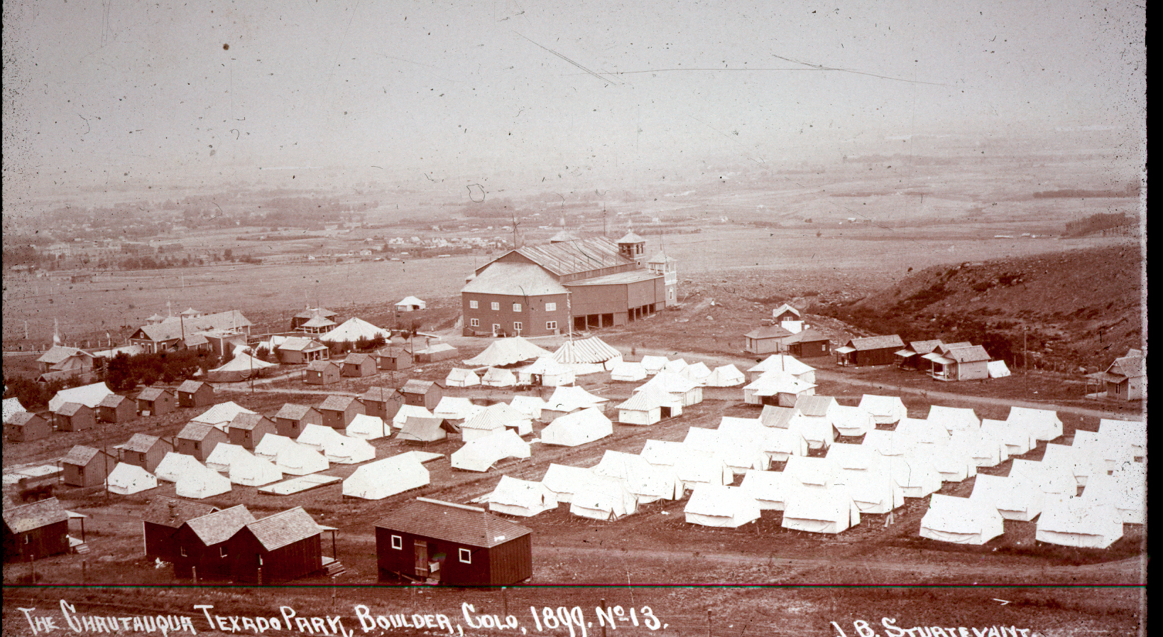 a group of tents in a field