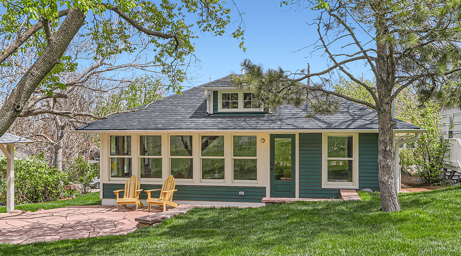 a house with a lawn and a porch