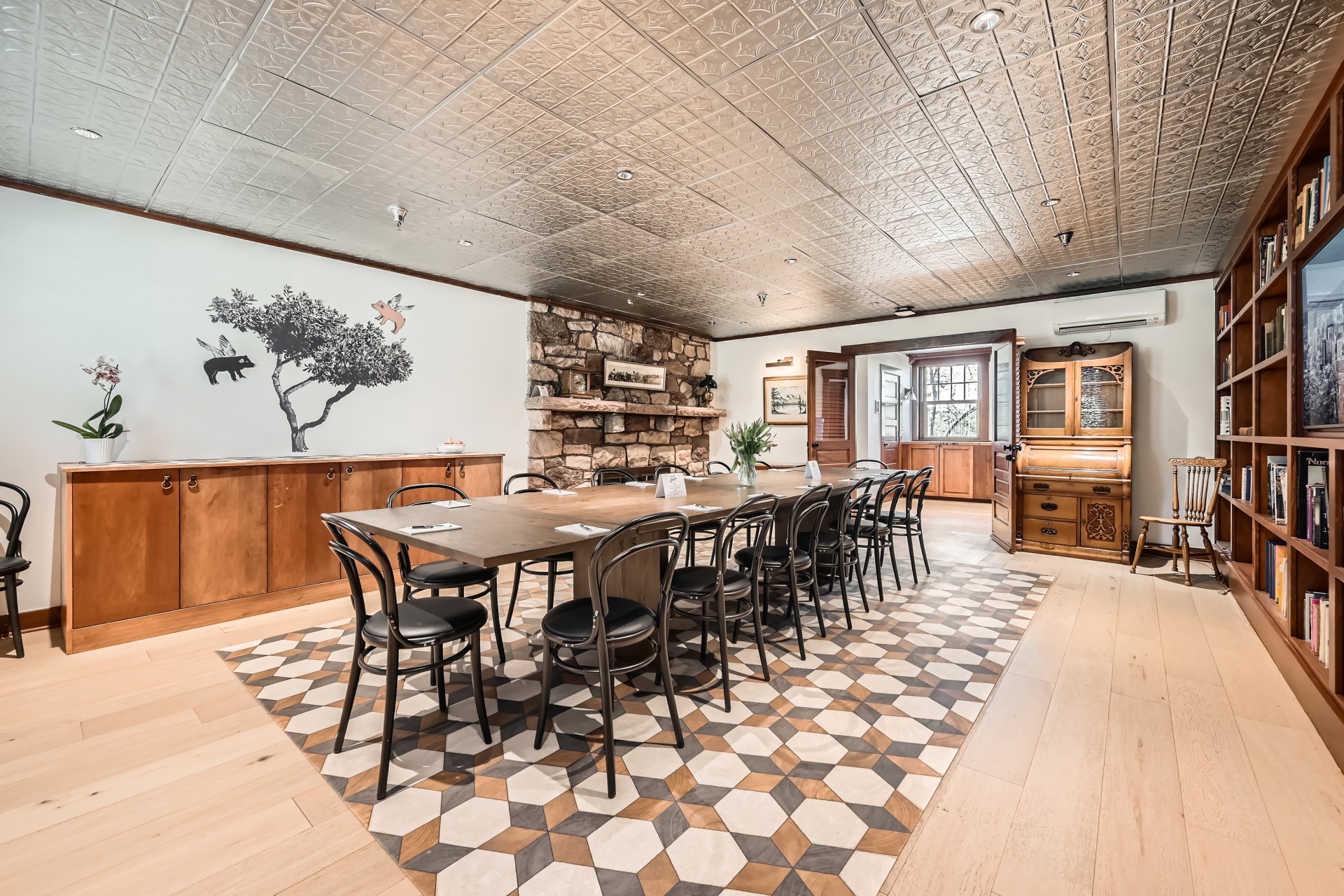 a room with a table and chairs