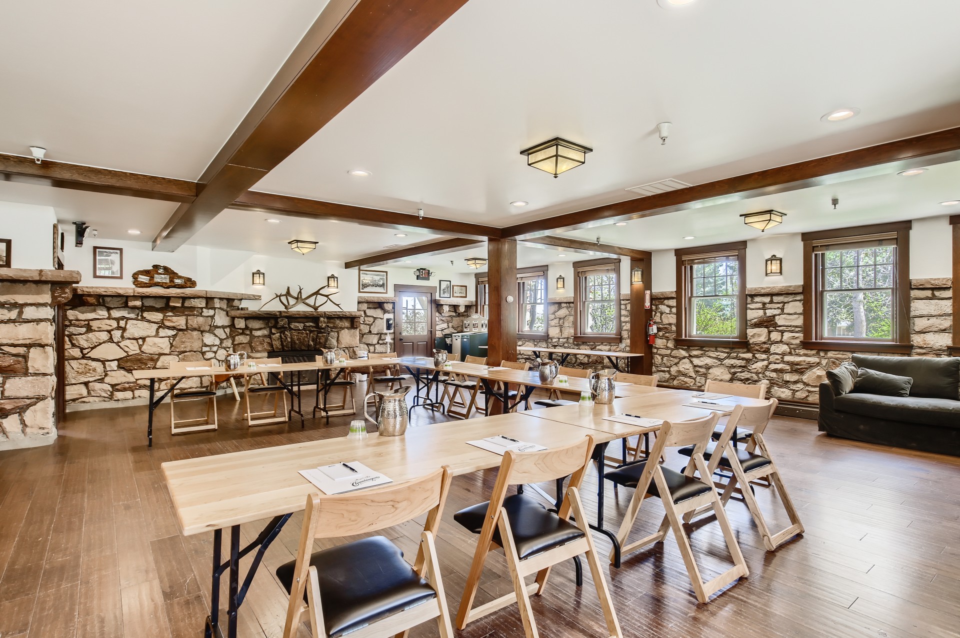 a room with tables and chairs