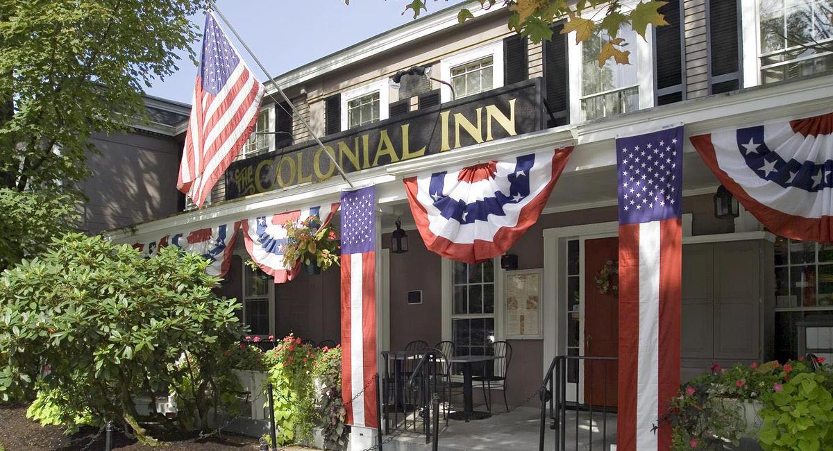 a building with flags from the front