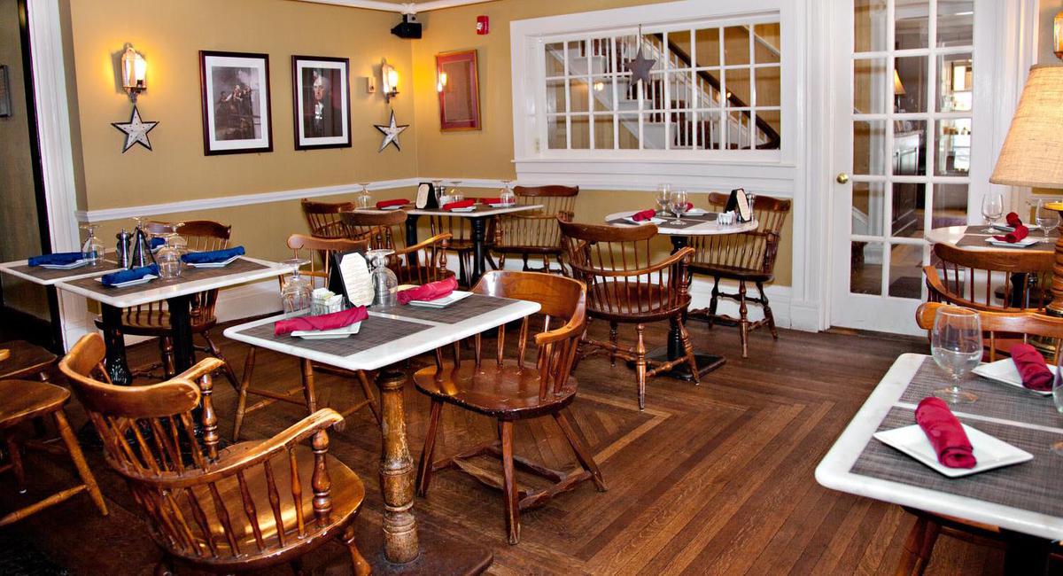 a restaurant with tables and chairs