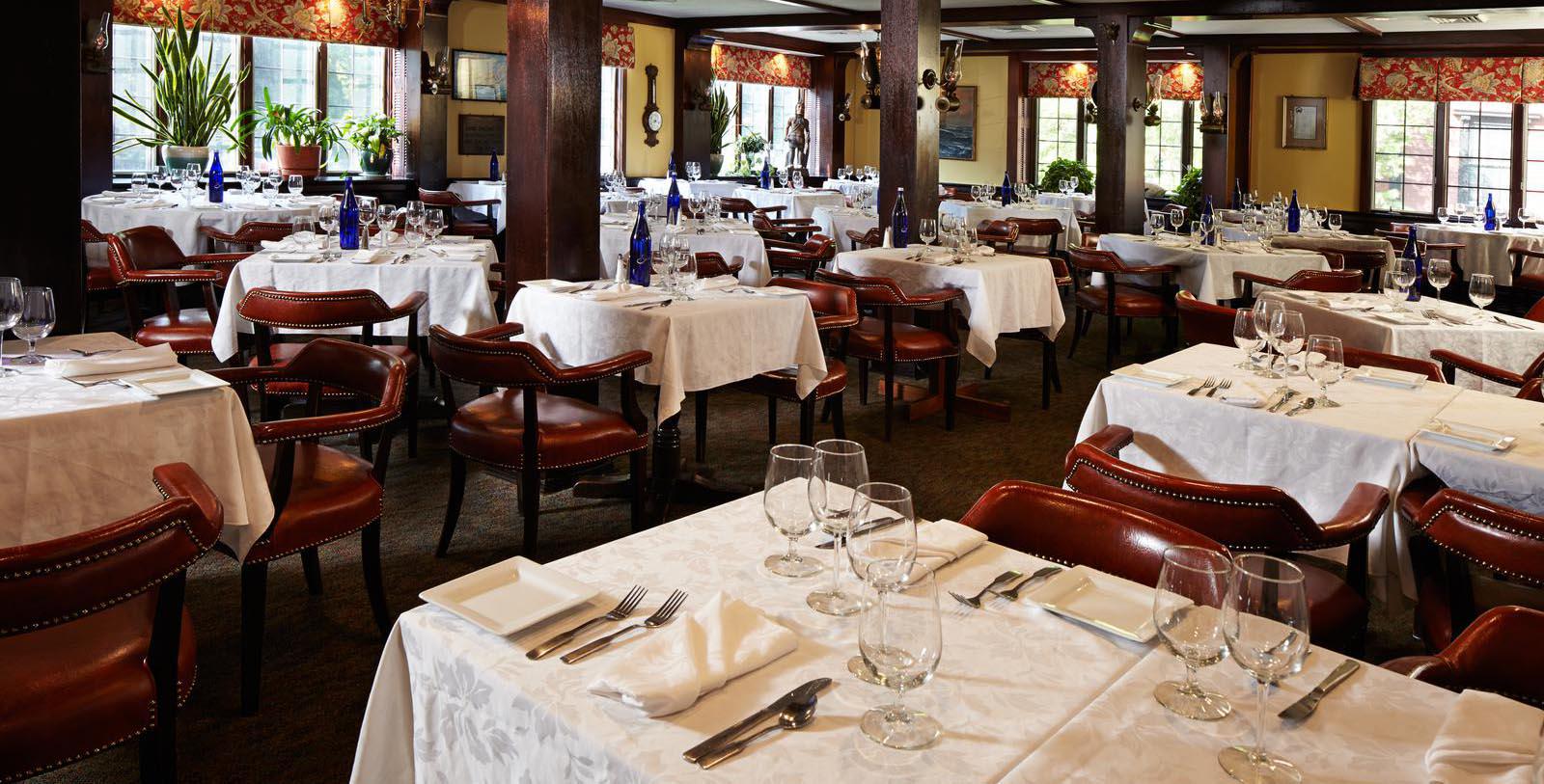 a restaurant with tables and chairs