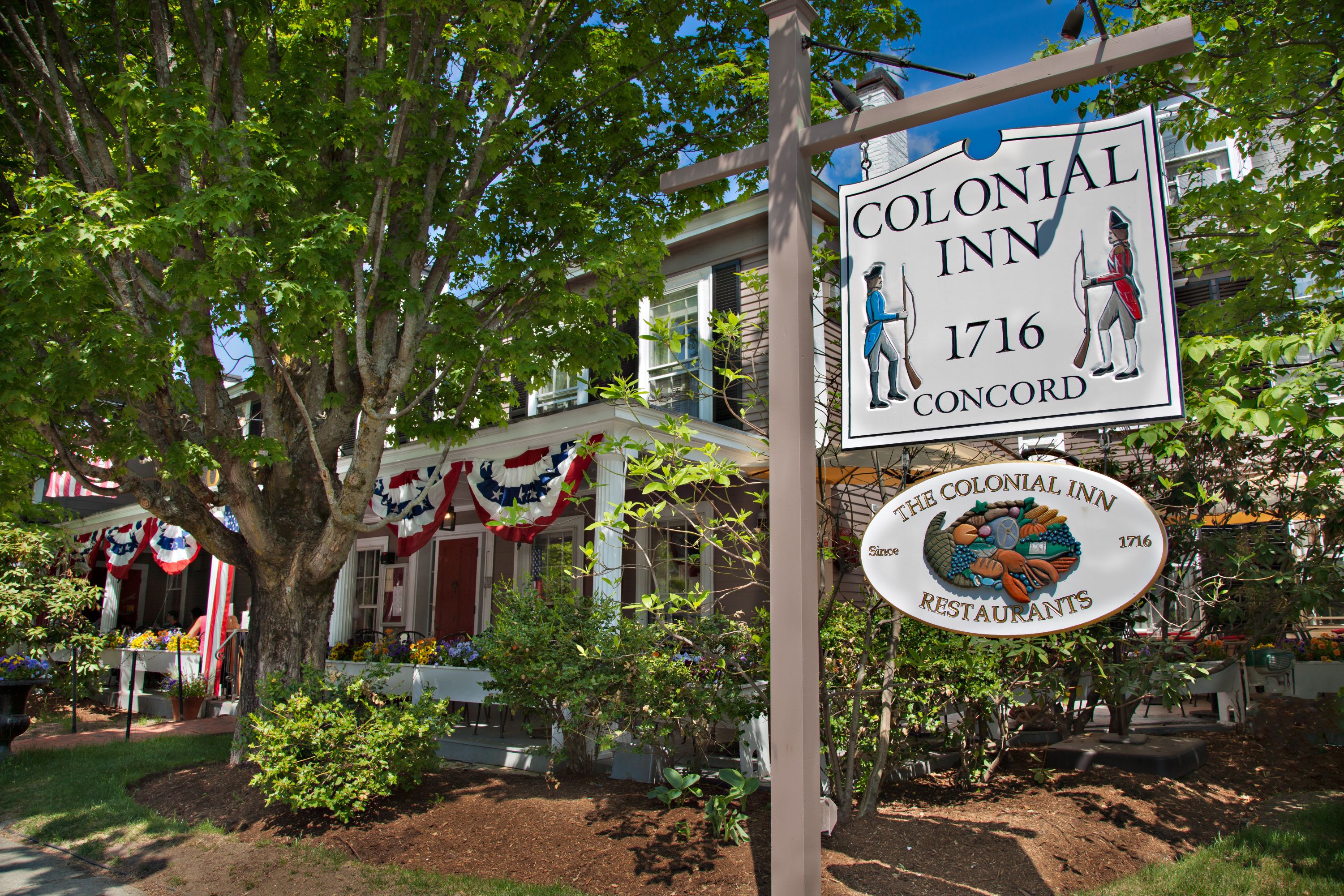 a sign in front of a building