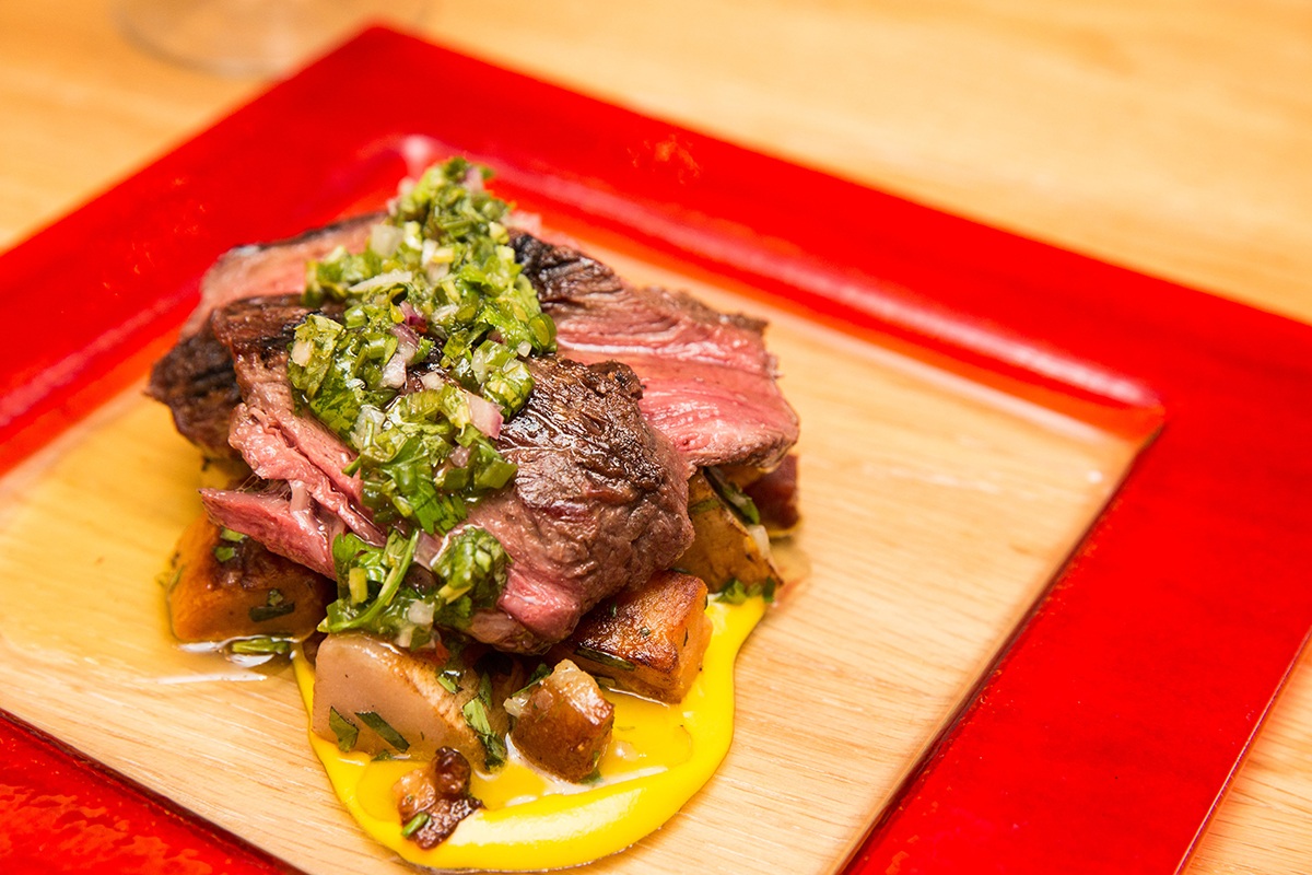 a plate of food on a red tray