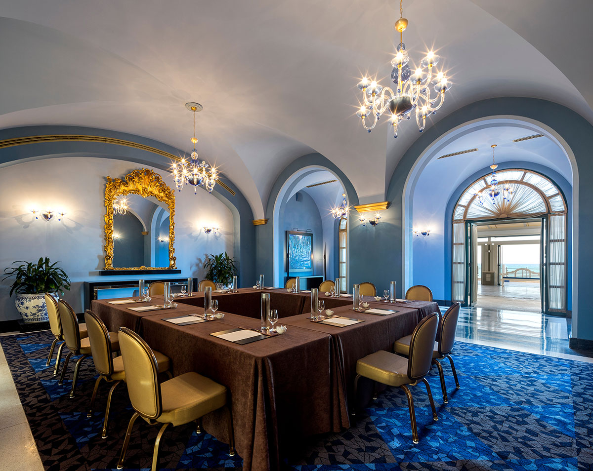 a large room with a table and chairs