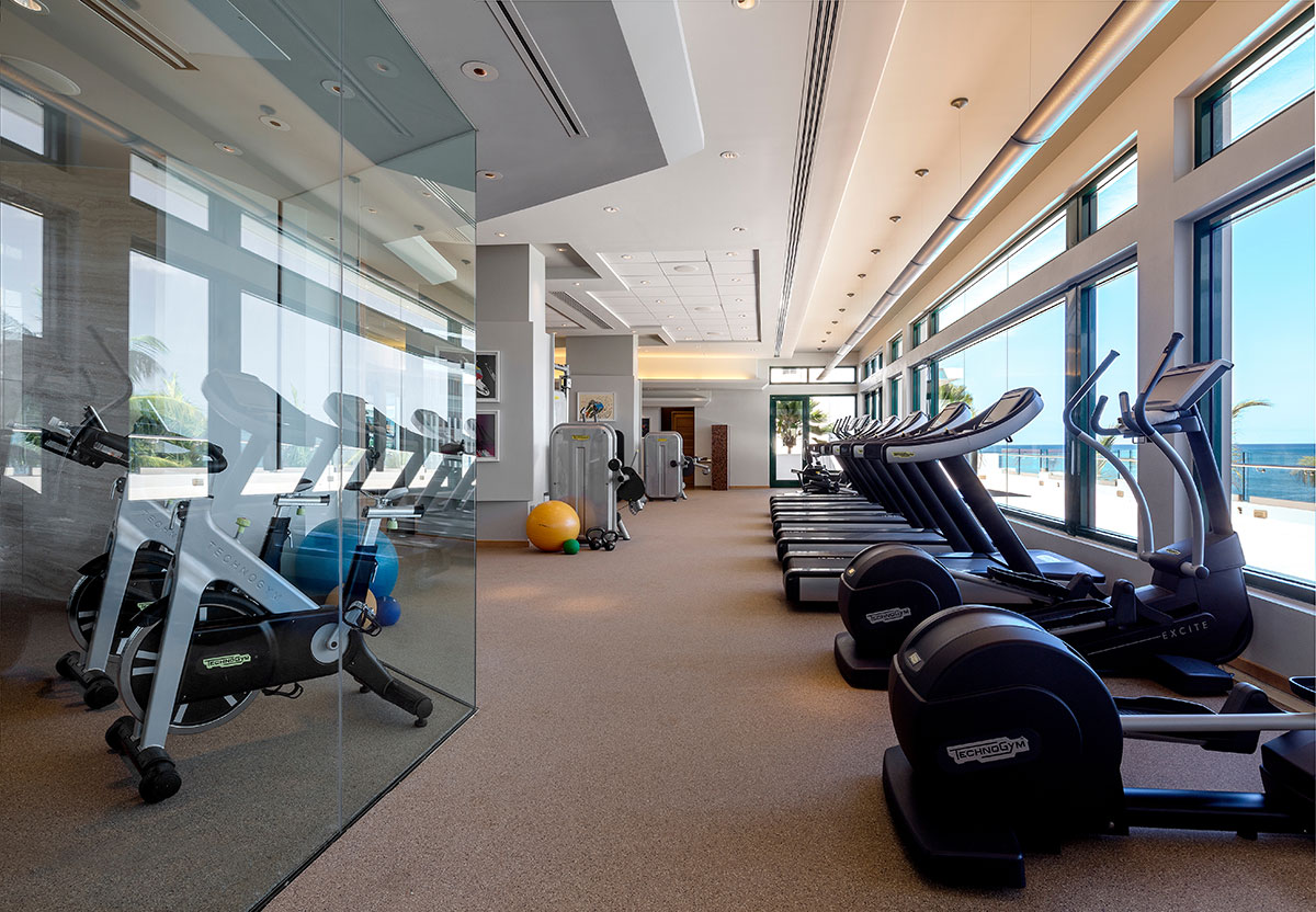 a room with exercise bikes and exercise equipment