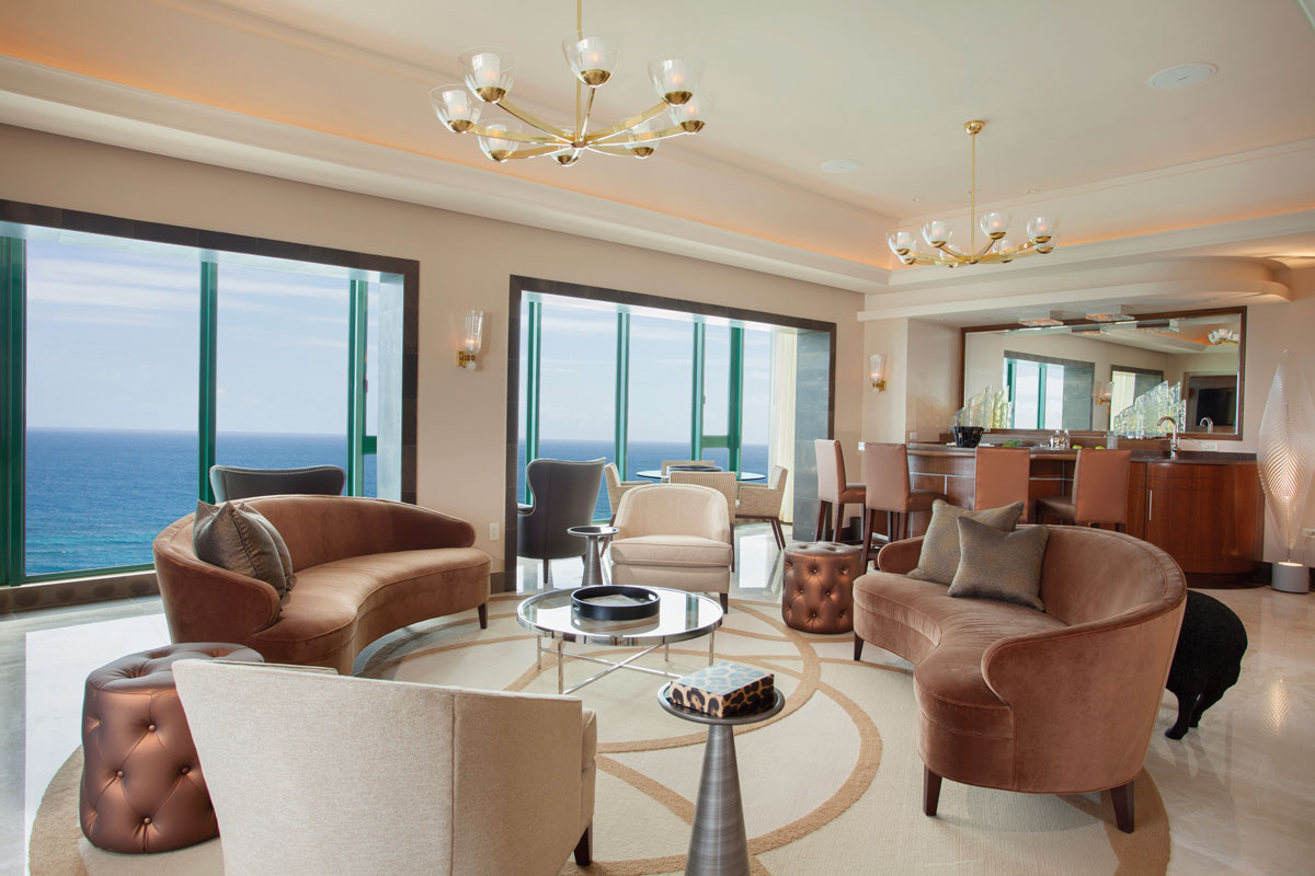 a living room with couches and a table