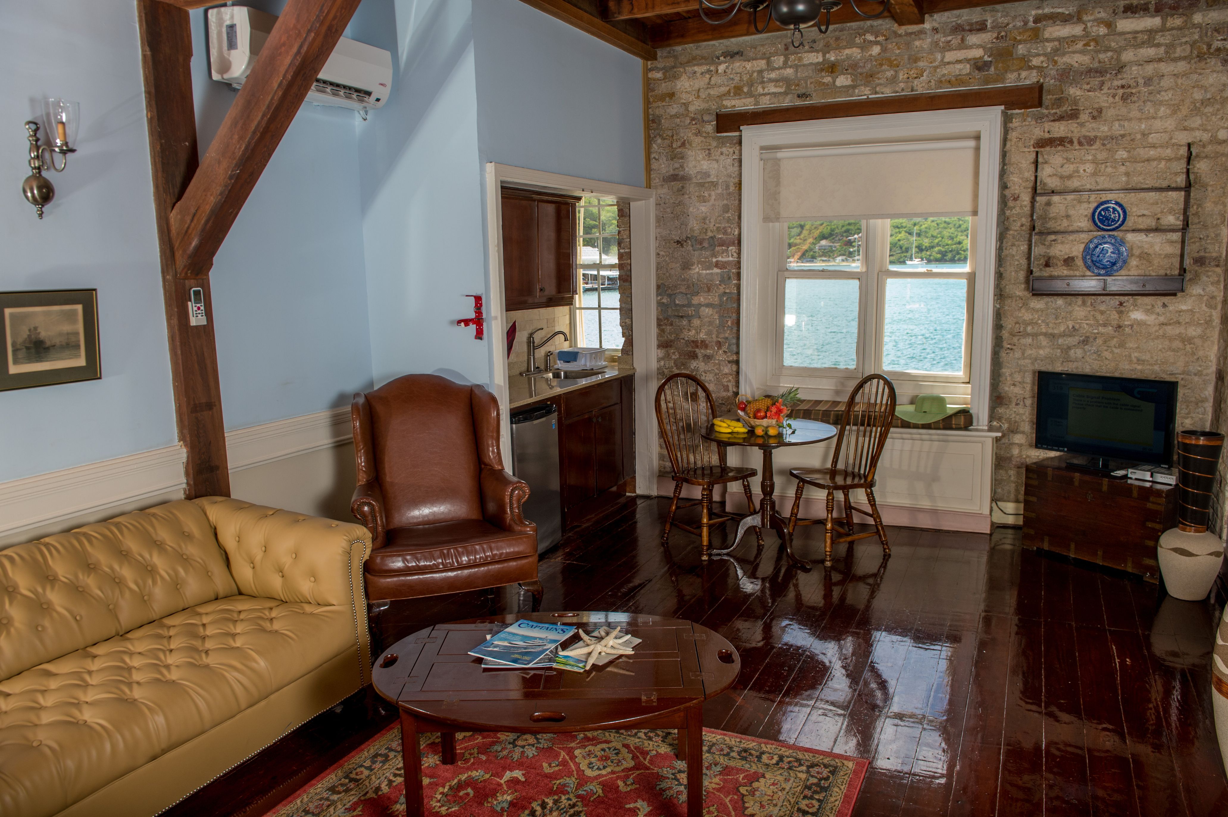 image of georgian suite sitting area copper and lumber store historic inn english harbour antigua and barbuda_high