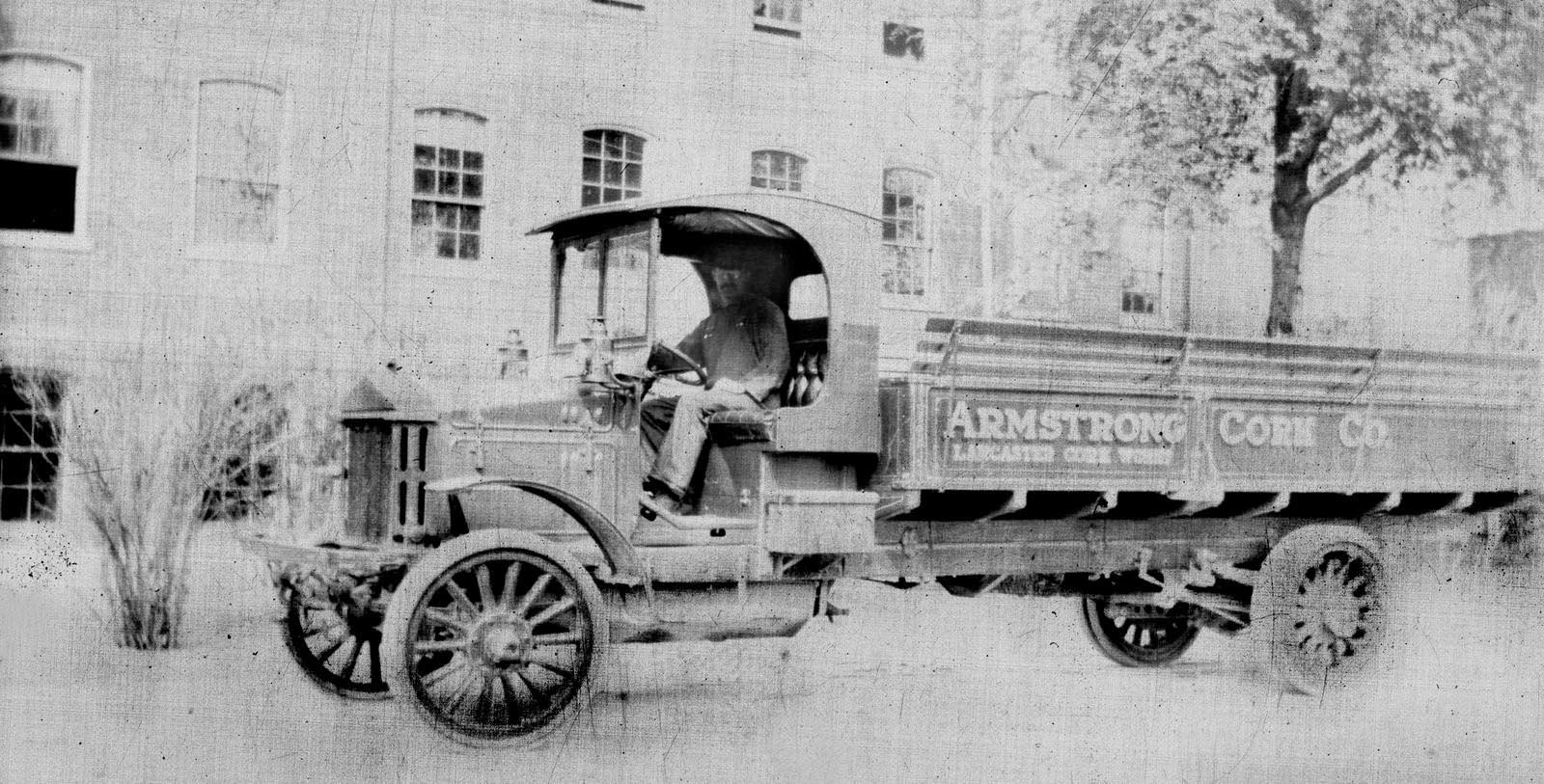 a man driving a truck