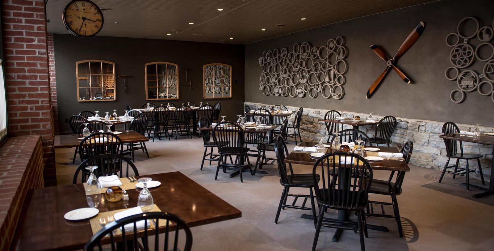 a room with tables and chairs