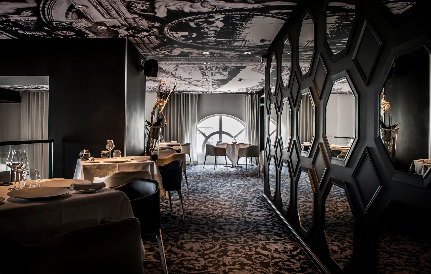 a room with tables and chairs