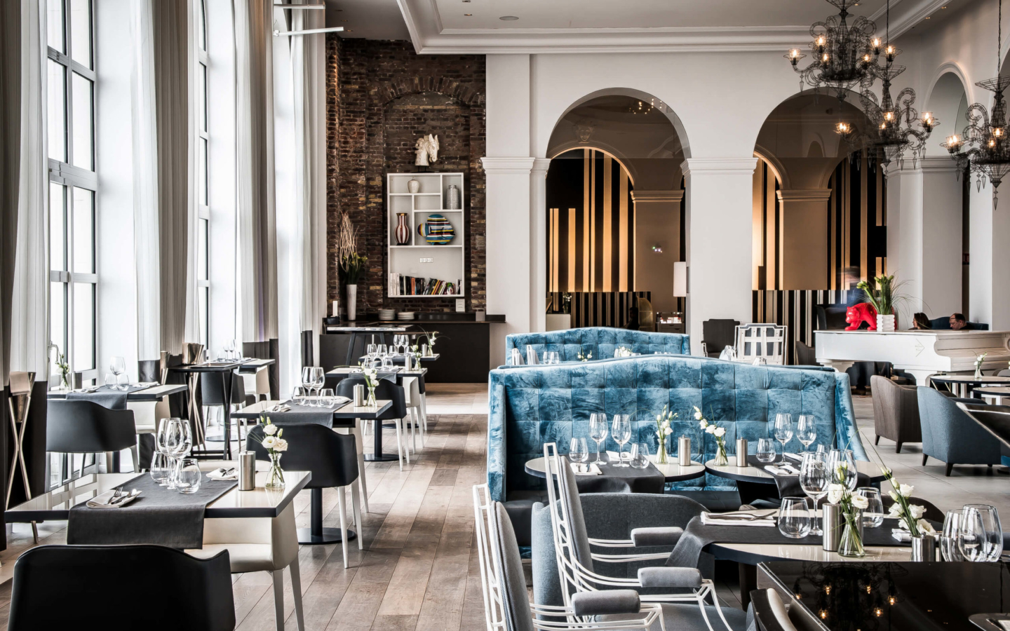 a restaurant with tables and chairs
