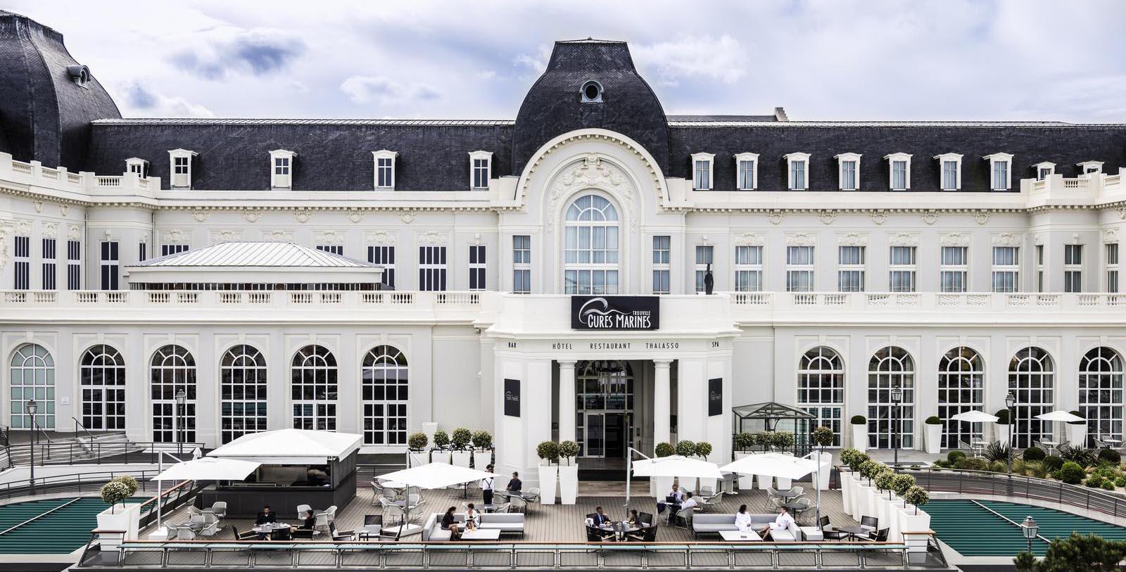 a building with people sitting outside