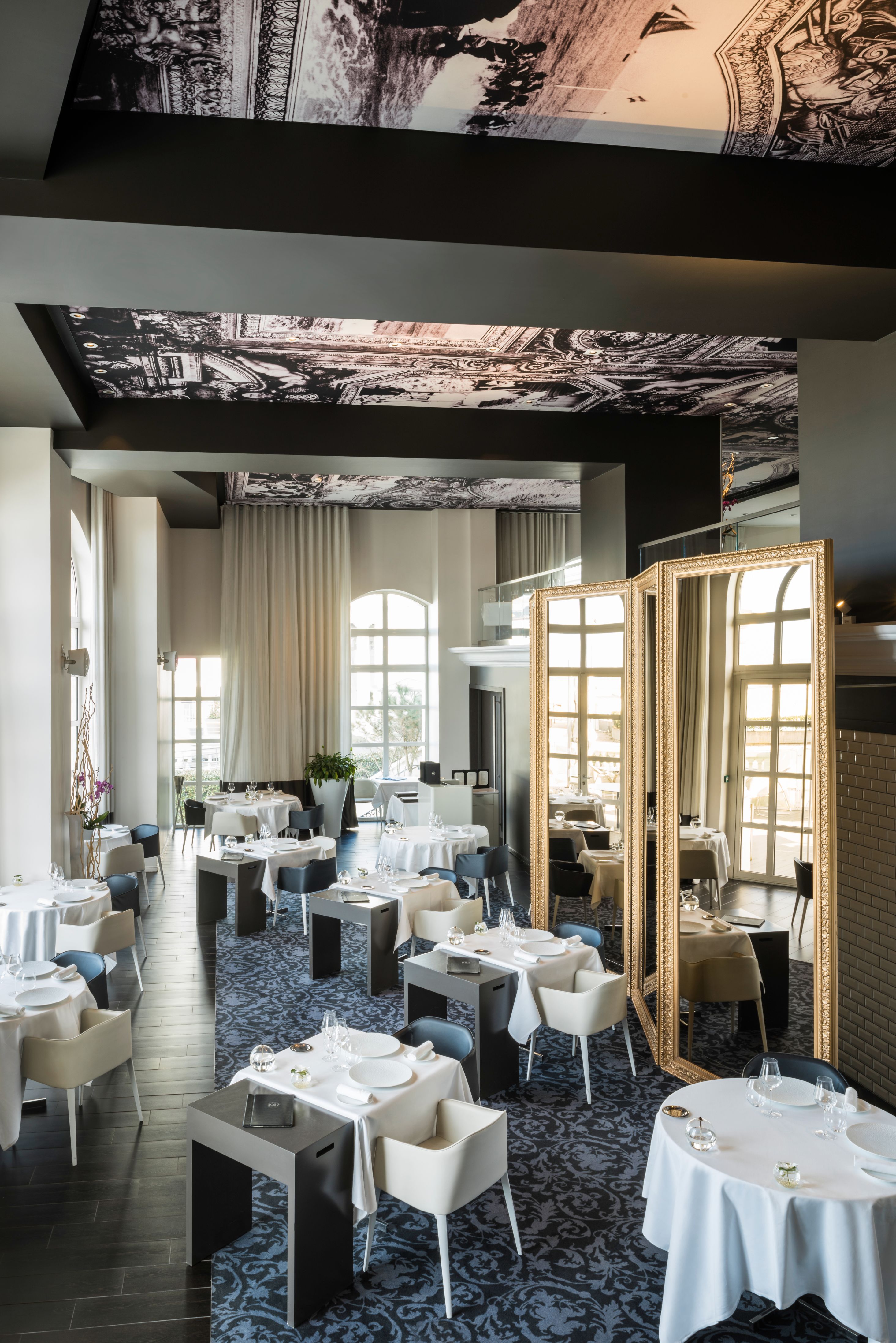 a room with tables and chairs