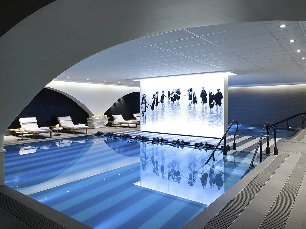 a pool with a picture of dancers in it