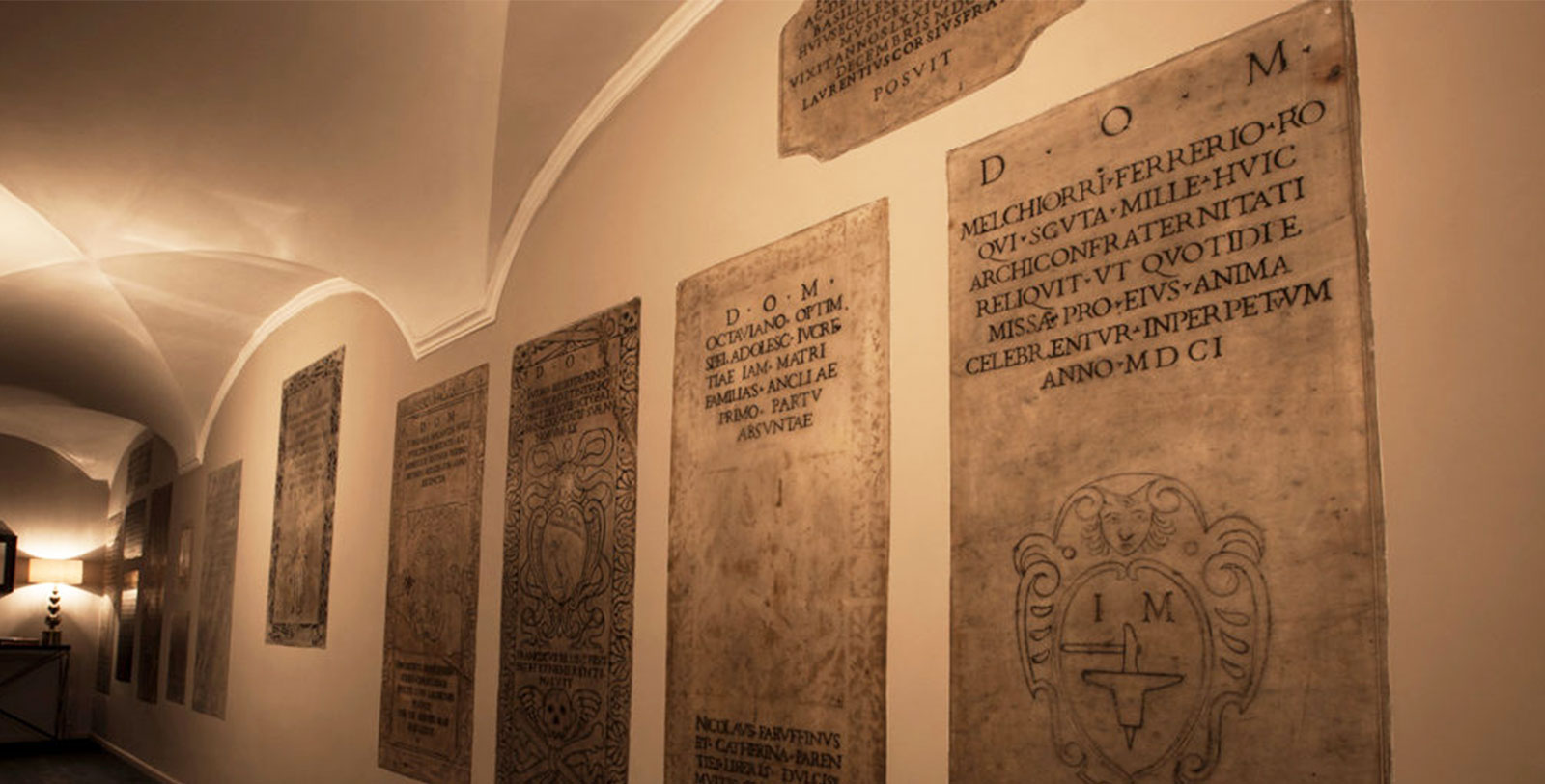 a wall with engraved text on it