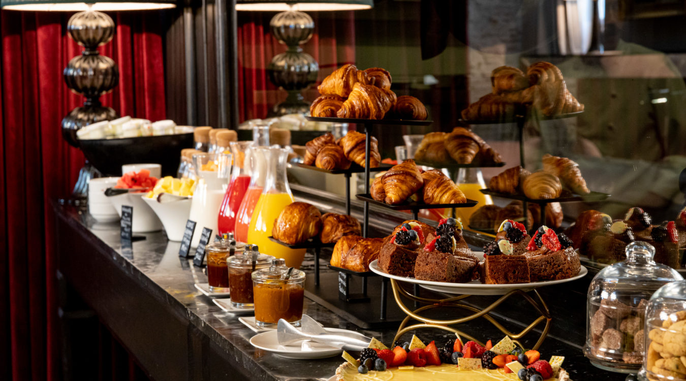 a buffet with food on it