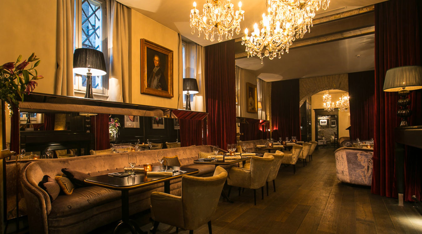 a restaurant with tables and chairs