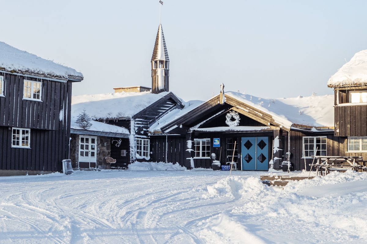 a house with snow on the roof